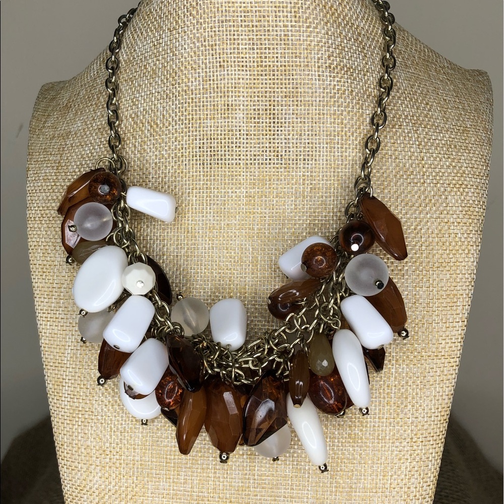 Chunky white, brown and amber colored necklace